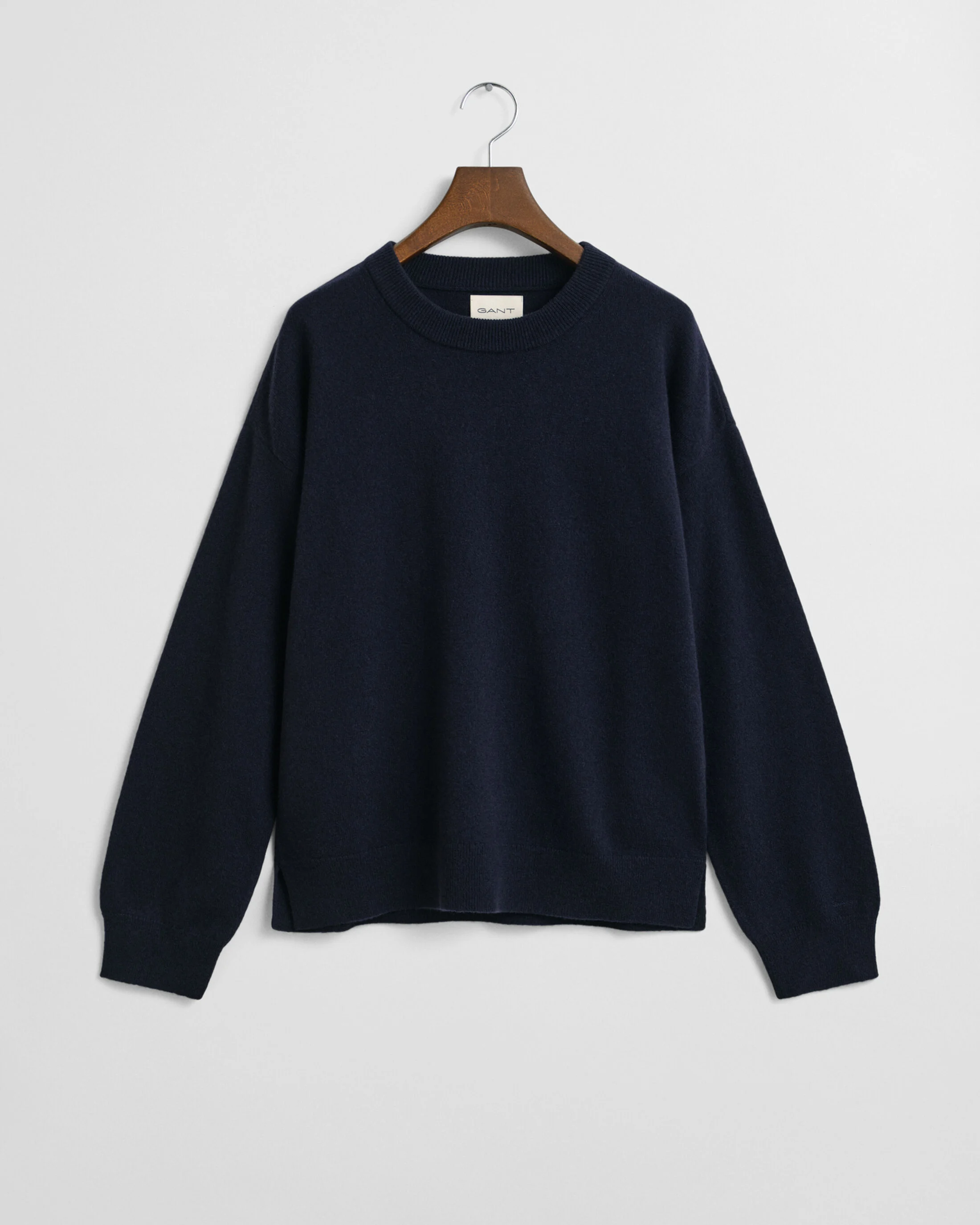 Dark sweater on hanger